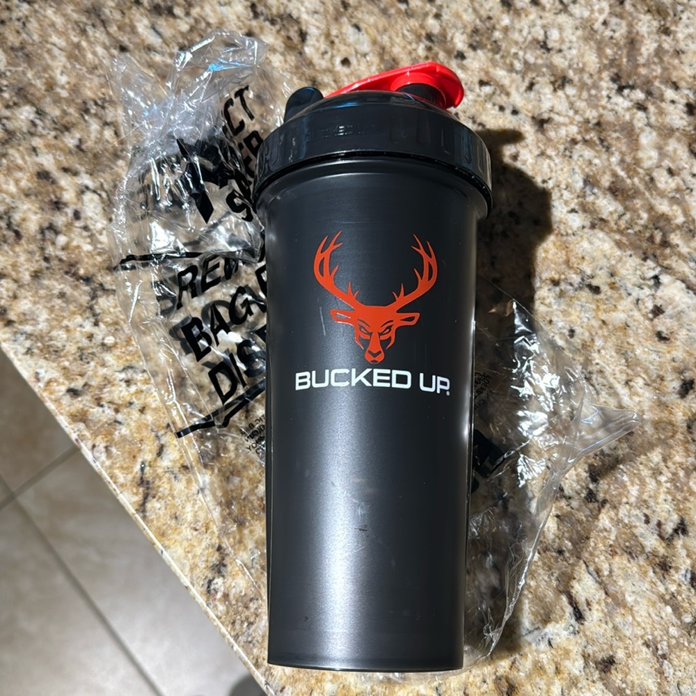Bucked Up 20oz shaker bottle (brand new) spill proof, durable, black and red